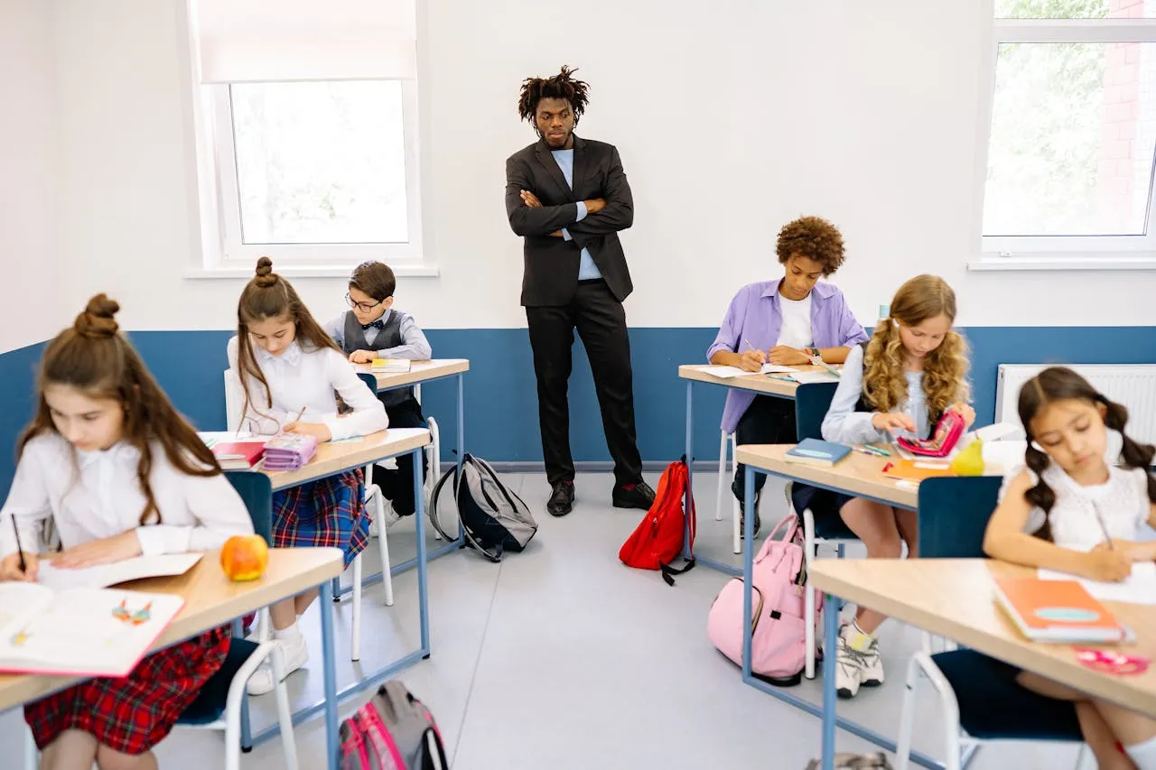 Teacher with students in an elementary school classroom